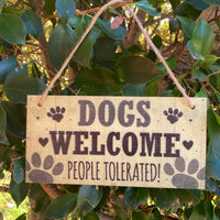 Dogs welcome people tolerated