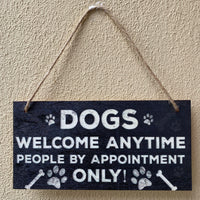 Dogs welcome people by appointment only