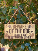 Beware of the dog the cat is not trustworthy either
