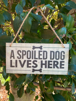 A spoiled Dog lives here
